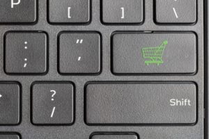 shopping cart icon on computer keyboard
