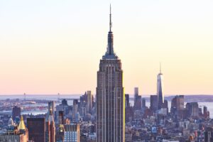 Cityscape view of Manhattan with Empire State Building at sunset