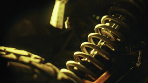 Close up of coil spring used as a part of car or motorcycle suspension system. Stock footage