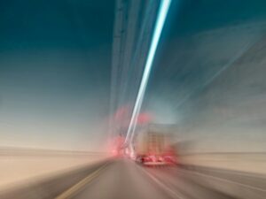Abstract motion blur of 18 wheeler truck in tunnel